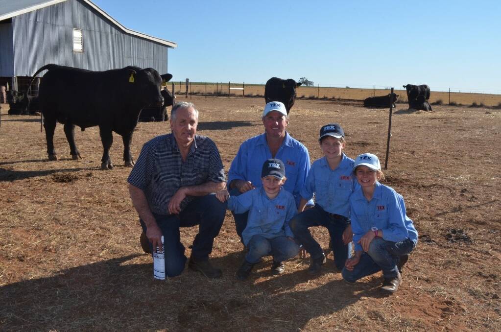 South Australian buyer Colin Flanagan, Granite Ridge Angus, "Granite Ridge", Avenue Range, with Ben, Lachie, Will and Rose Mayne, Texas Angus stud, "Doongara", Warialda, with the top-priced bull, Texas Western Express H639, who sold for $14,000.