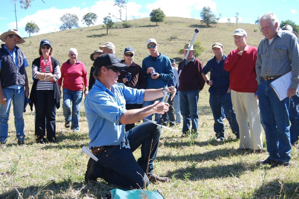 Norco agronomist Tony Gordon demonstrates pasture meter reading at the field day.