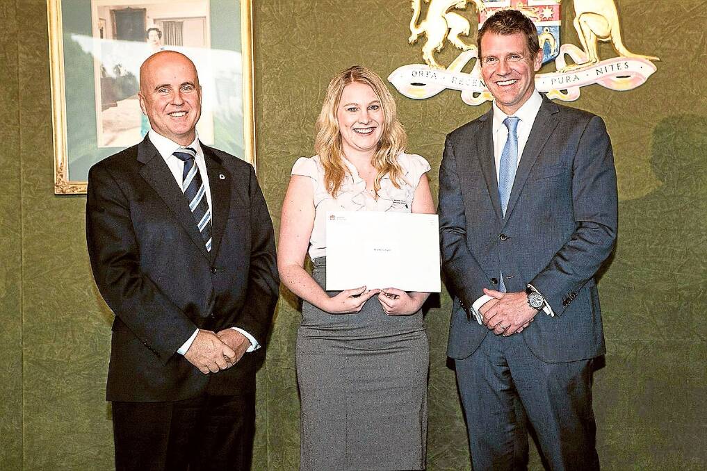 Renee Fagan, with Education Minister Adrian Piccoli and NSW Premier Mike Baird, receiving her award.