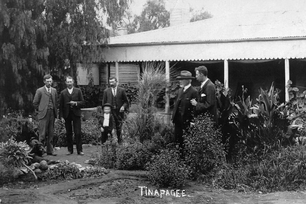 A Feehan family group pictured at "Tinapagee" in 1907.  The photo was taken using a timer on a camera by a visitor to the station, James Benson, who is the man in the centre with the young boy (Feehan family collection). 