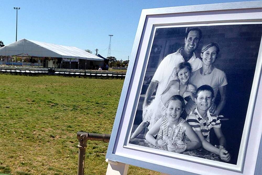 A family portrait at the Lockhart Recreation Ground, where a public memorial for the family was held.