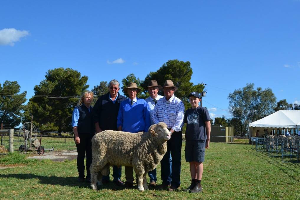 The top priced ram at the One Oak ram sale.  Melissa Connor and Ray Norman, Graham Wells, One Oak, Ian Marwedel, One Oak classer, Dubbo, Michael Elmes, Smart Stock, Narrandera and Tom Norman.
