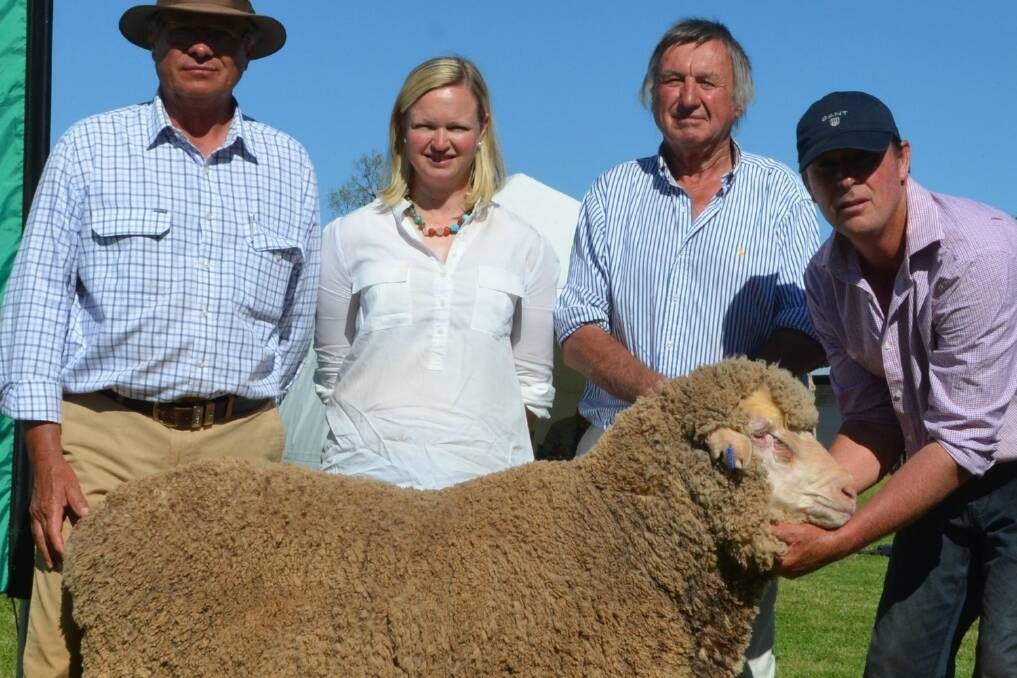 Michael Elmes, Smart Stock, Liz Robinson, Natue Pastoral Co, Daryl Harrison, manager Natue Pastoral Co, and Alastair Wells, One Oak Poll Merino stud, with the top priced ram.