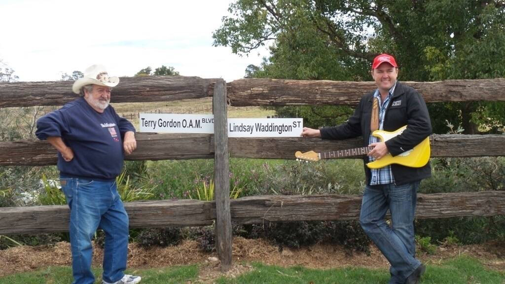 Country music stars Terry Gordon and Lindsay Waddington with streets named after them at the site of the new Clarence Country Music Festival.