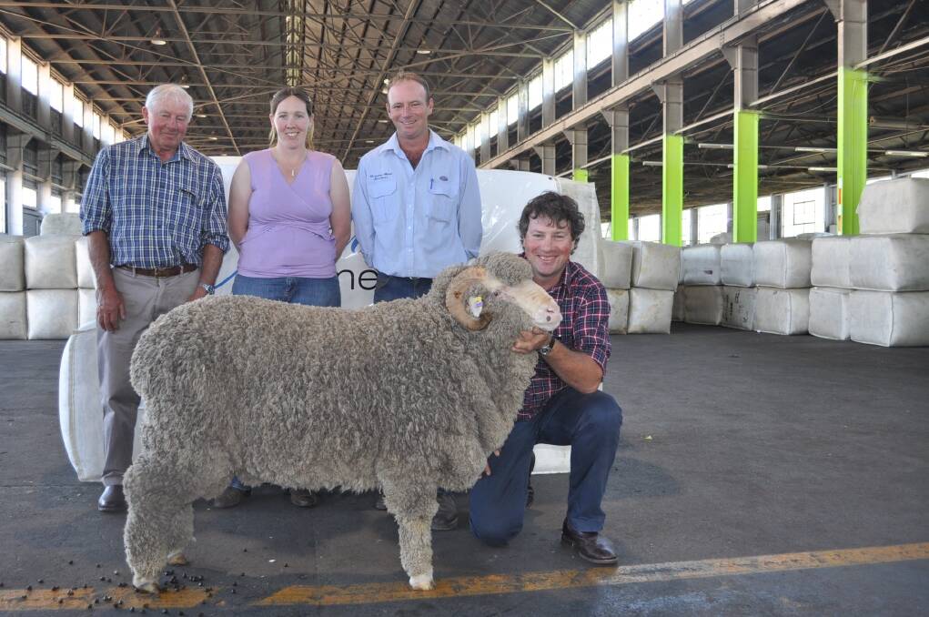 Adina Merino stud principals Ray (left) and James Barron (right), Peak View via Cooma, with top priced buyer Nicki Alcock, Greenland Merino stud, Bungarby, who paid $5000 for the top ram with her agent Brett Povey, Monaro Wool Services, Cooma.
