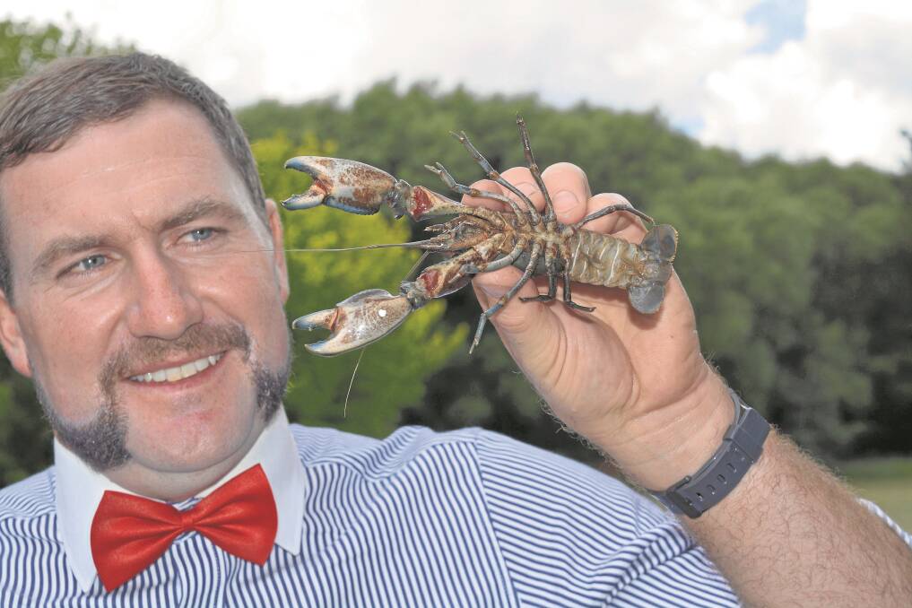 Adrian Willis, Crookwell, organiser of the annual Clawfield Cup, with one of the yabbies before auction time
