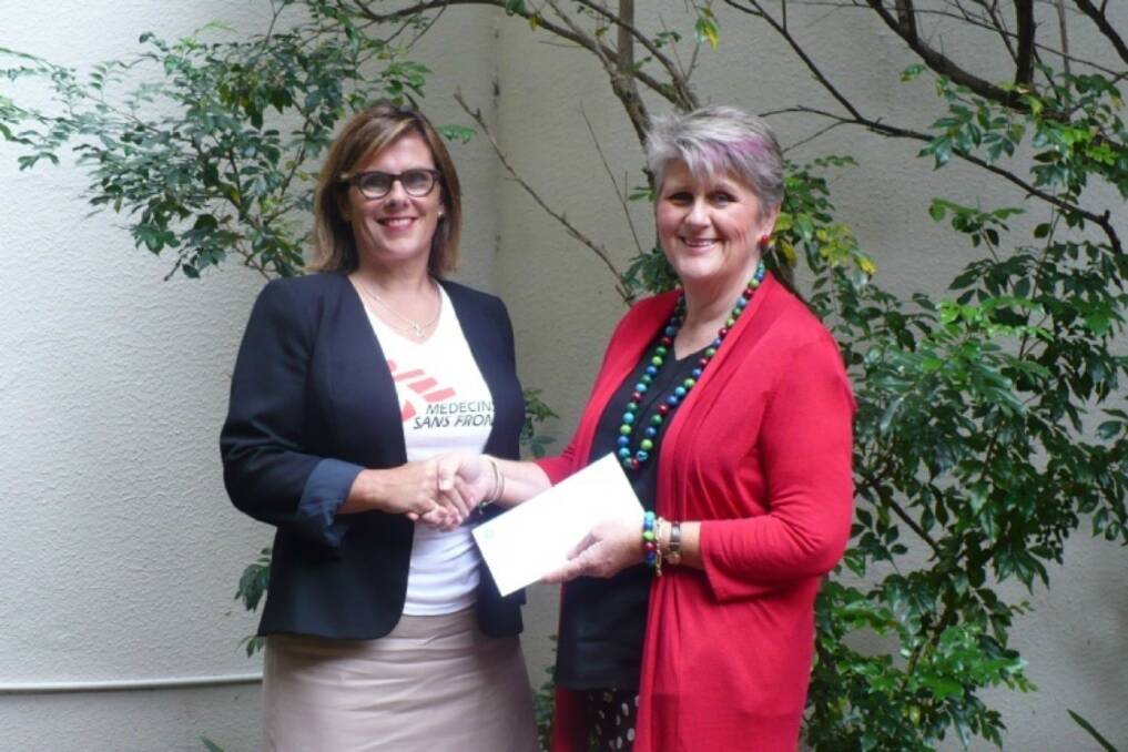 CWA's Tanya Cameron presenting the cheque for $50,000 to Ruth Molloy of Médecins Sans Frontières Australia. 