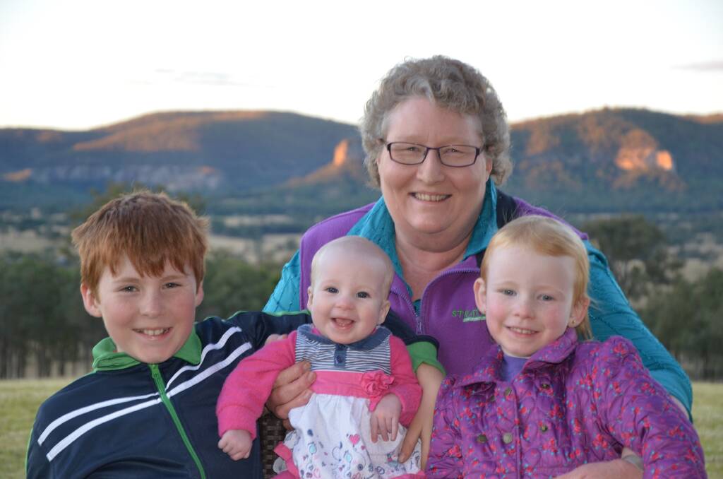 Australian Breastfeeding Association (ABA) volunteer counsellor and long-time member Margaret Wicks, "Homelands", Upper Dartbrook, with grandchildren James Wicks, 9, Neve, 7 months, and Isla-Rose, 3.