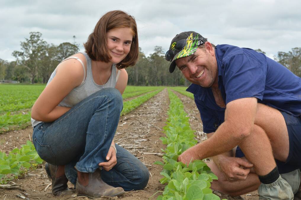 Grain and oilseed producer Paul Fleming, "Carrill" at Yorklea, near Casino, and daughter Jess in this season's soybeans. Photo: Shan Goodwin
