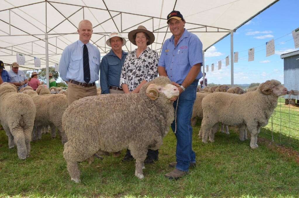 John Croak, Australian Wool Network stud stock, Tamworth, buyers Keith and Ainslie Savage, "Malino", Delungra, and Waverley Downs stud principal Sean Ballinger with the highest selling ram, which made $1500.
