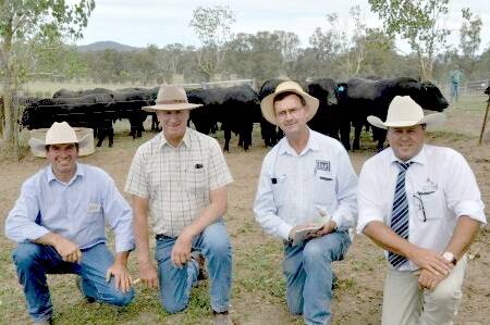 Dunoon Angus stud principal Jock Harbison, Holbrook, auctioneer Michael Glasser, GTSM, Wodonga, and buyers Gerard ryan, Brian unthank, Albury and Ian Seidel, "Buckingbong", Narranderra, who paid $14,000 for the top sire at the Dunoon sale on Monday.