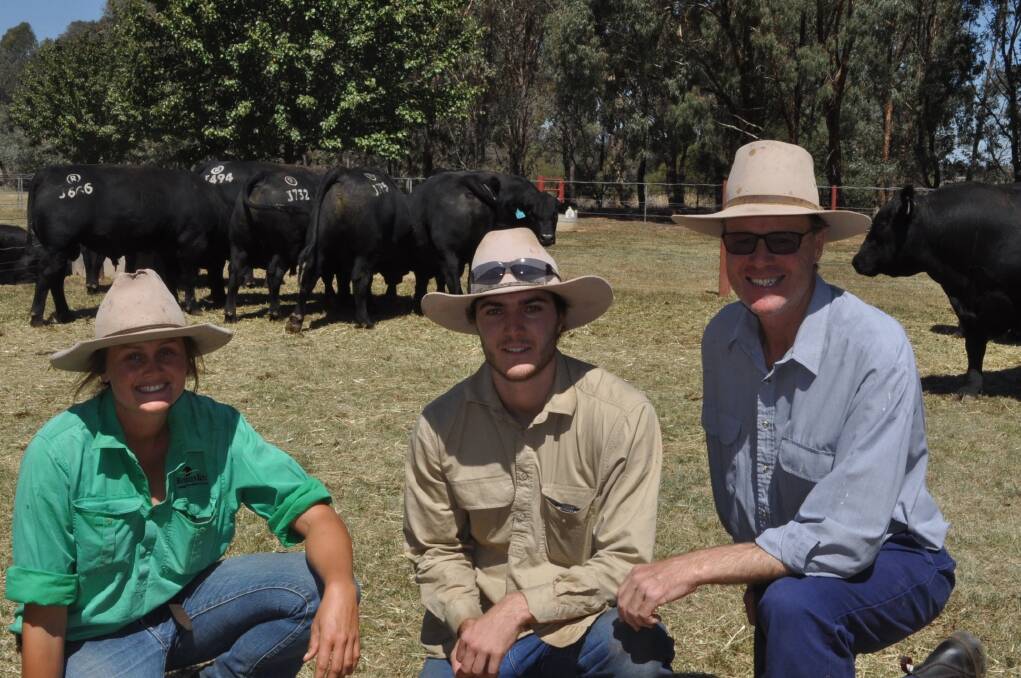 Ruth Corrigan, Rennylea Angus, Bowna, with volume buyers Andrew and Angus Bourchier, "Burrongong", Urana, who paid to $10,000 for seven bulls, averaging $8143.