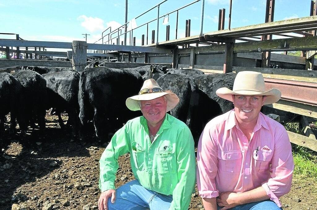 Vendor Tony Clift with Nathan McConnell, Elders Tamworth, who bought the charity pen on behalf of Adrian Spencer, “Ironbark”, Barraba, for $9146.