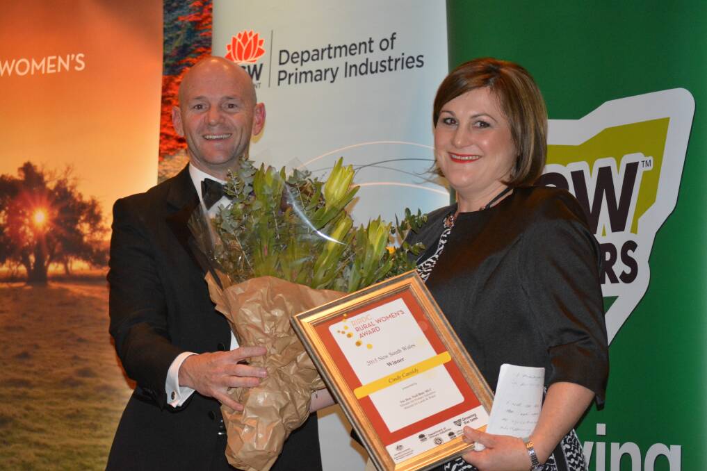 Primary Industries Minister Niall Blair presents the award to Cindy Cassidy.