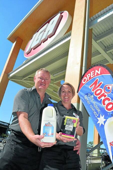 Murwillumbah IGA store owners Leanne and Brett Bugg with Norco products.