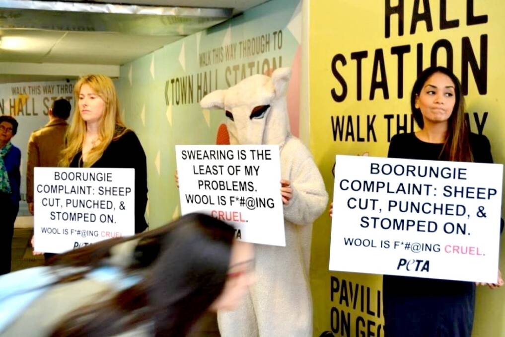 PETA activists protesting on George Street, Sydney.