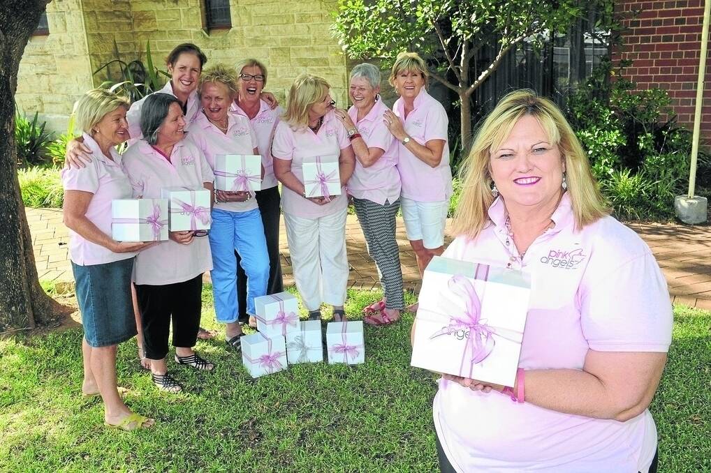 Founder and current President of the Pink Angels, Donna Falconer with some of her volunteers (from left) Chris Robinson, Vicki Crooks, Jo Crowley, Pam Urquhart, Anne Gemmel, Margo Green, Lesley Hargreaves, and Sue Gavenlock.