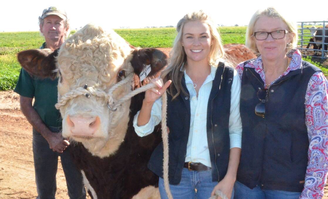 Buyer Brenton Collinson, Gwabegar with Robyn and Anna Holcombe, Rayleigh Poll Herefords and the $6500 top-priced bull