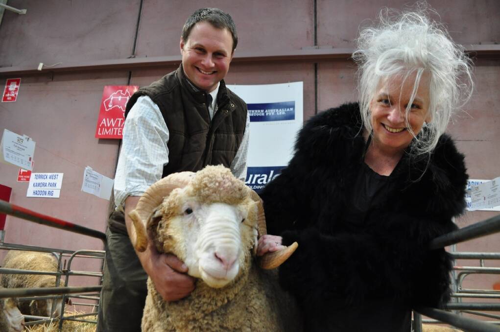 National Hands Network developer Miranda Pereira at the Australian Sheep and Wool Show last year meeting a Merino ram held by Manning Doughty, Hay. Pereira will be a special guest at the Elders Riverina Sheep Expo at Deniliquin on Friday.