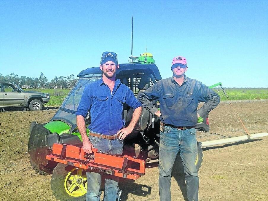 Rimanui Farms district cropping manager Byron Birch, Moree, and Precision Cropping Technologies’ (PCT) Nick Barton testing soil with the EM38.
