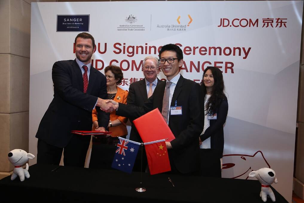 Sanger's new chief executive James Campbell joined JD.com founder Richard Liu to sign the agreement in China witnessed by Trade Minister Andrew Robb and Meat and Livestock Australia.