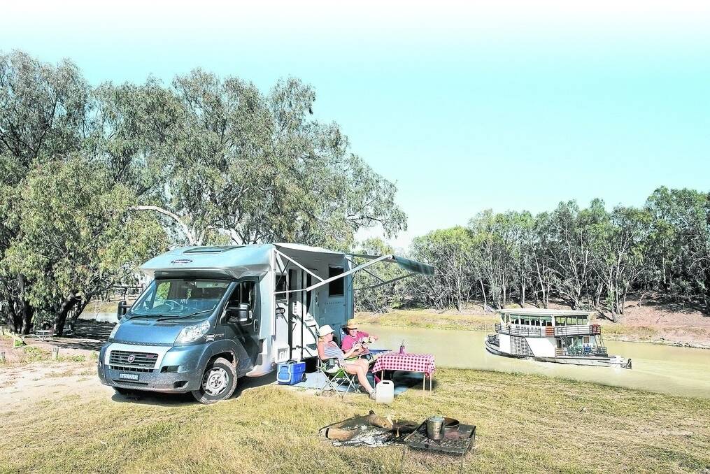 Recreational vehicle holidays are now the fastest growing tourism sector in Australia. This Trakkaway 700 motorhome and its owners take in the atmosphere of western NSW at Bourke. Photo: Simon Bayliss.