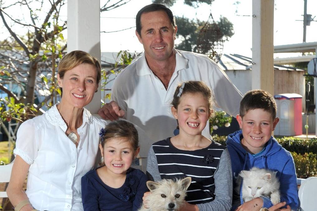 Geoff and Kim Hunt with their children Phoebe (left), Mia and Fletcher Photo: Les Smith  