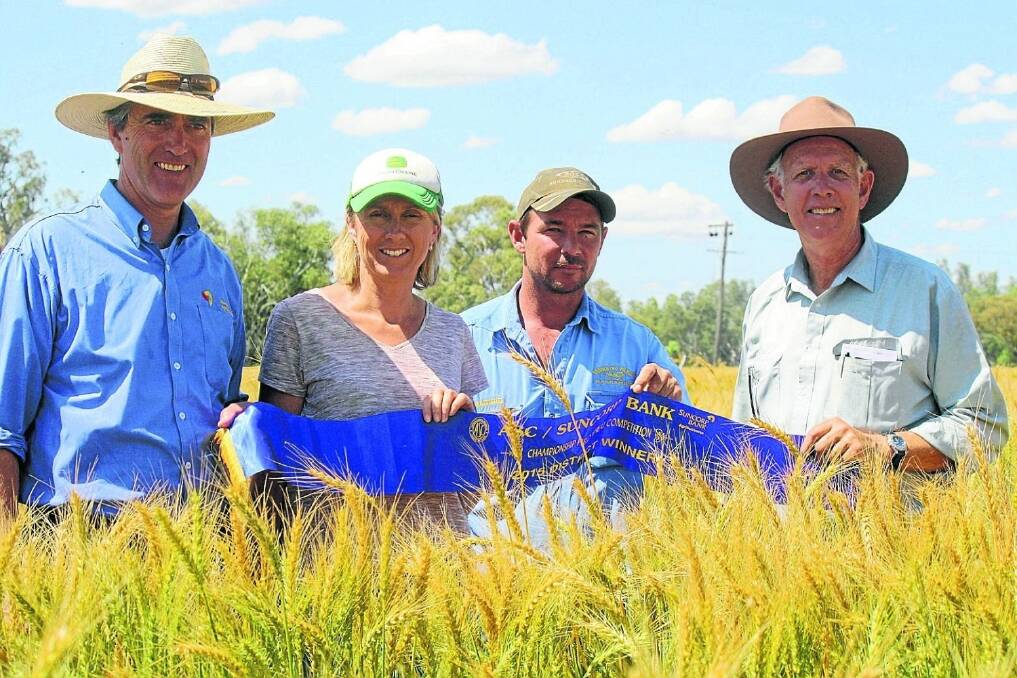 Suncorp Agribusiness manager Nick Connors, Dubbo, with wheat crop winner Jodi Browning and farm manager Shannon Thomas, Narramine Station, with judge Paul Parker, Young.