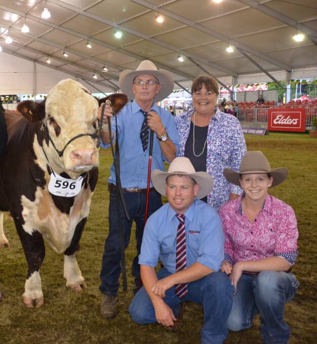 Steve and Therese Crowley, Tycolah stud, Cobbadah, with son Ben Crowley, and Rheni Austin, Barraba, with supreme exhibit Tycolah Oakwood at Sydney Royal Show in 2017. 