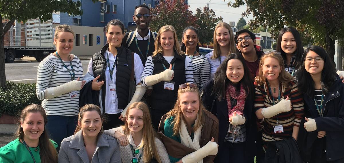Fifteen medical and nursing university students practiced their plastering skills on a recent  visit to the Central West last week.