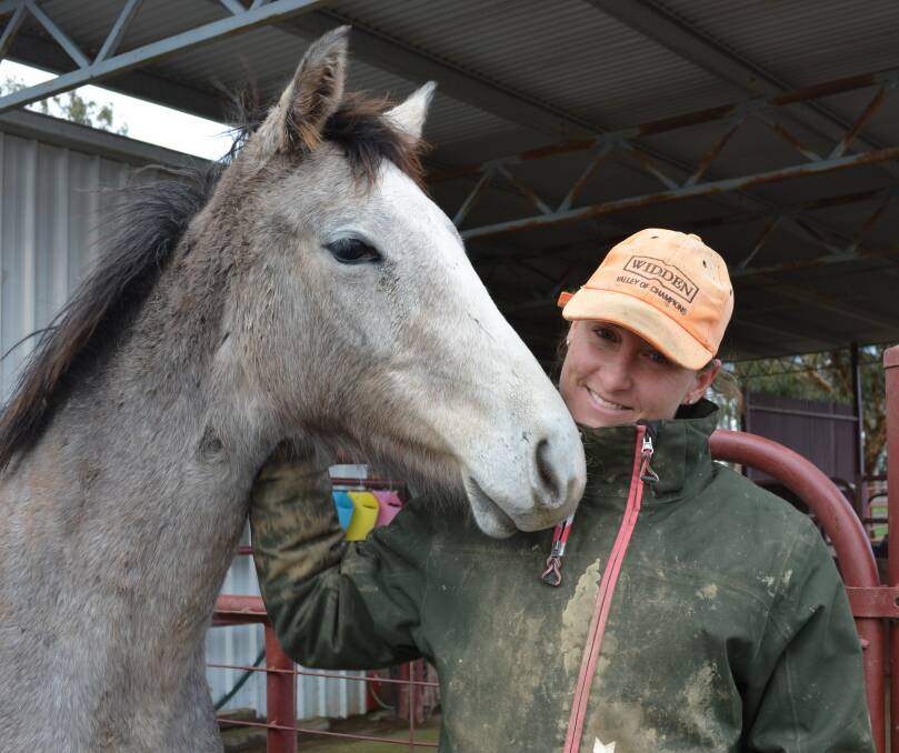 Claire enjoys spending time handling Thoroughbred foals at "Allandale Park", Hobbys Yards, where she and her father John raise foals for the racing industry.