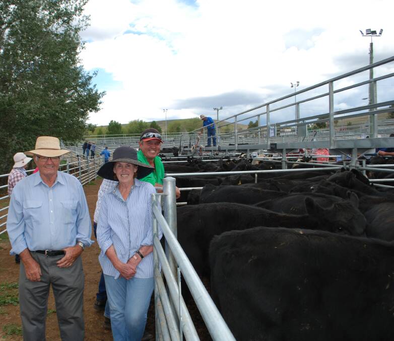 John and Janneane Cahill with their son Andrew, Coolama, Berridale, NSW, sold 17 Angus steers for $1240 at Cooma on Wednesday last week. Photo: Bridie Edwards