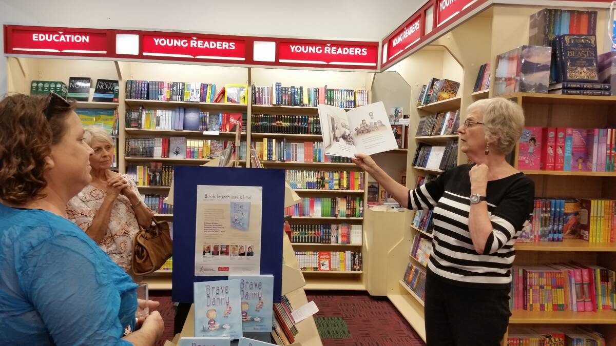  Jude Doughty from Dymocks Albury reading 'Brave Danny' at the recent book launch.