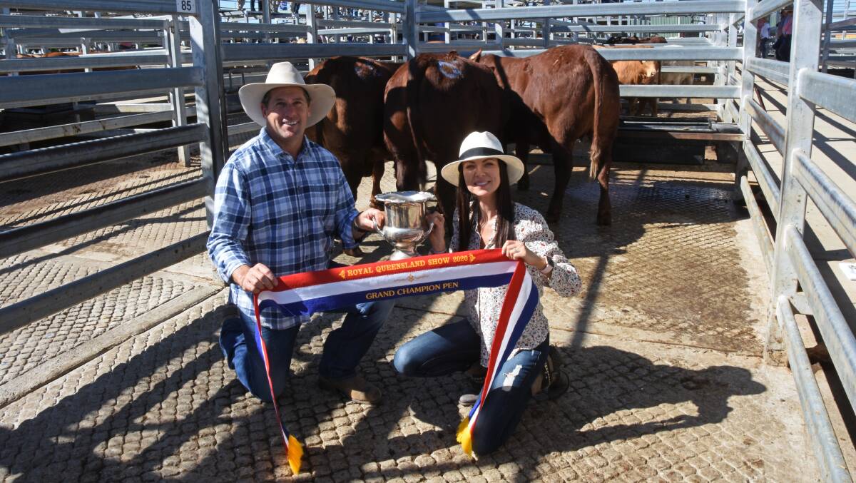 Andrew and Fiona Bassingthwaighte, Yarrawonga Cattle Company, with their pen of three Santa Gertrudis heifers that claimed the grand champion ribbon.