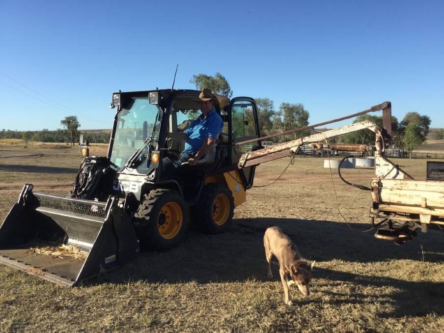 Sam developed a hoist that allows him to get into machinery around the farm. Photo: Jenny Bailey.