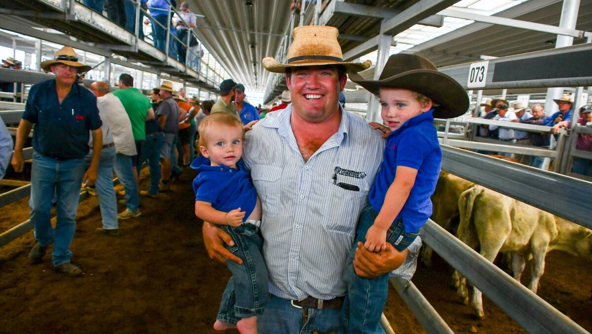 Ian Morgan Livestock agent Ben Goodman with his sons Huxley, 1, and Alfie, 2. 
