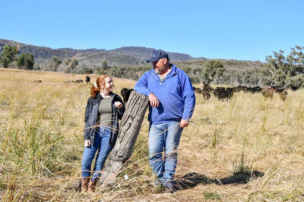 Elliot Shannon (right) and his daughter Molly of Tiona, Bugaldie, are seeing the benefits of their hard work in the drought. 