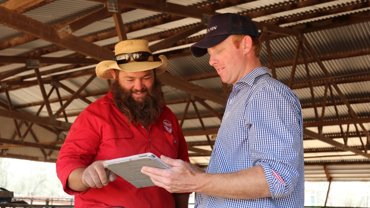Producer Ben Watson and Grow livestock agronomist Ed Hiscox. 