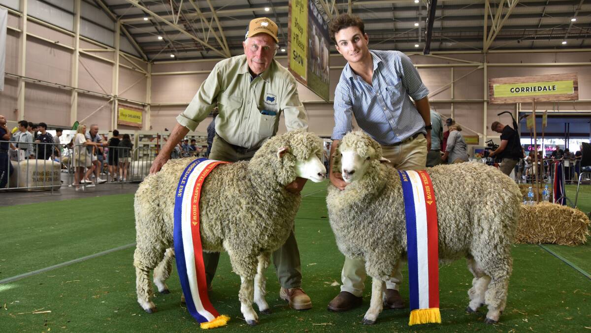 Corriedale grand ram and ewe with breeder Tony Manchester, Roseville stud, Kingsvale, holding the ewe. The ram is held by Brandon Douglas, Wallacia. Picture by Karen Bailey.