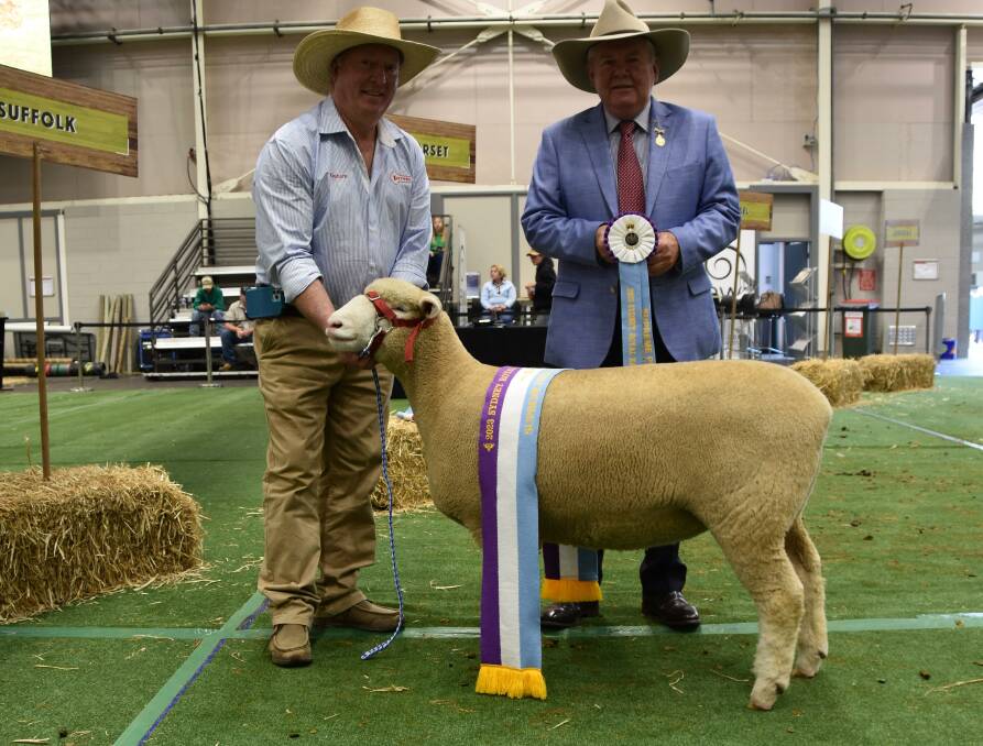 Supreme prime lamb ewe and exhibit with breeder Graham Gilmore, Tattykeel Poll Dorsets, Oberon, and RAS president Michael Millner, Millthorpe. Picture by Karen Bailey.