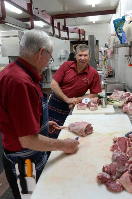 Gary Steenbergen, Gary's Gourmet Meats, Young, preparing lamb rumps with butcher,  Arnie Brown, who has more than 50 years experience. 