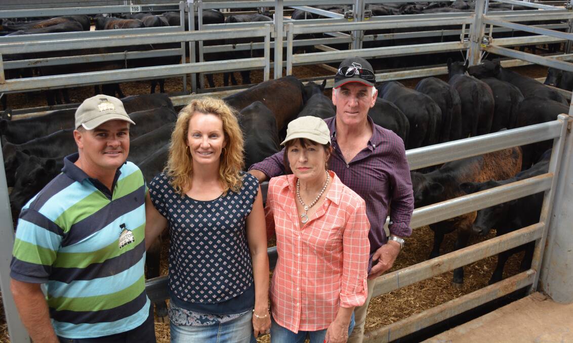 Tim and Jessica Scott, Table Top Angus, Table Top, with Joy and Rob Mackie, "Kaputar Park", Gerogery, at the Wodonga weaner sale last Thursday. Photo by Karen Bailey.