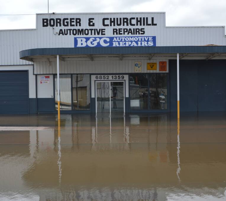 DEEP WATER: Floodwaters have closed many businesses in Forbes.