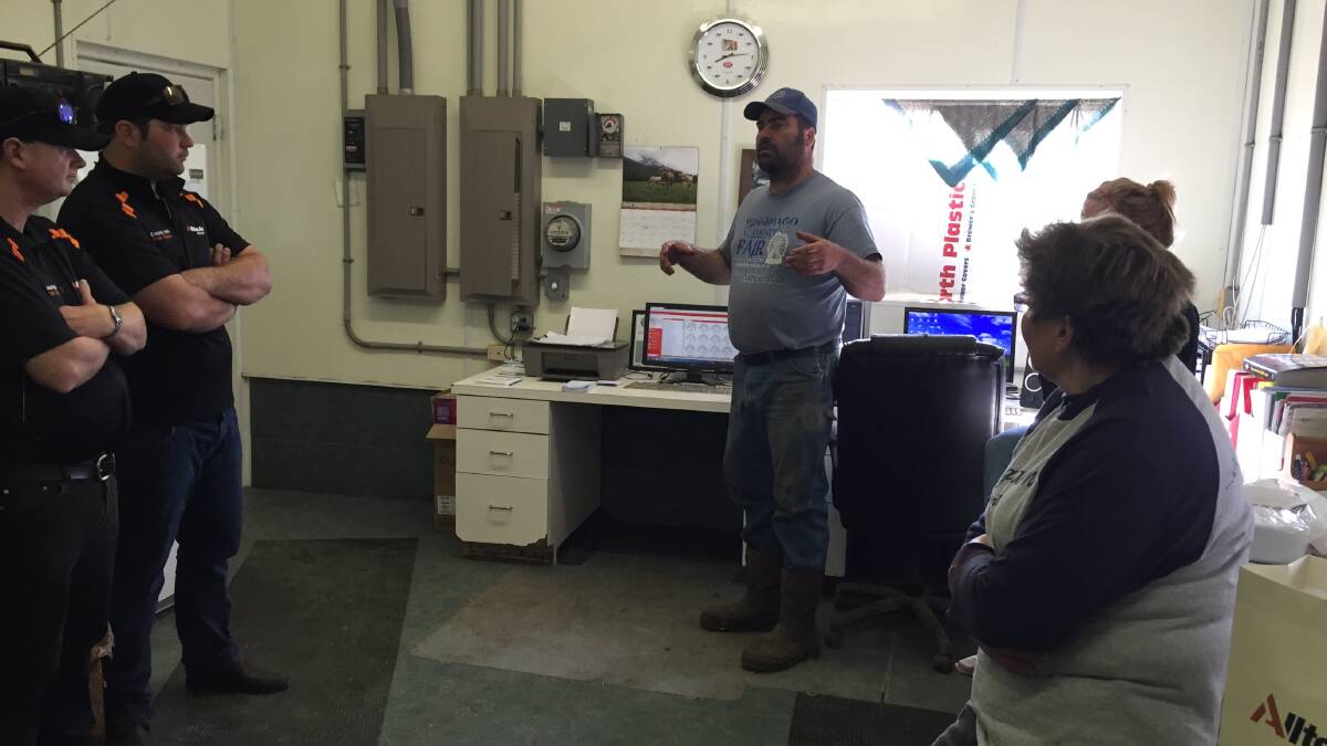Charlie Knigge explaining the Lely robotic milking system used on Knigge Farms, Omro, Wisconsin.