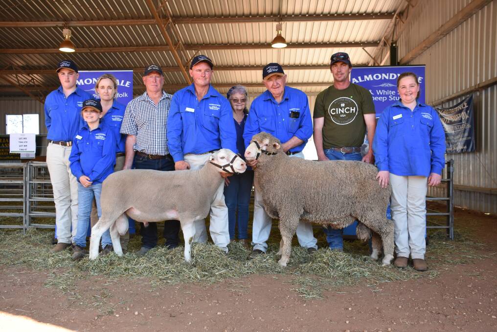 The Routley family with top price buyer of the White Suffolk, Doug Combe, Manfred White Suffolks, Hay and top price buyer of the Poll, Brian Shore, Tumut. 