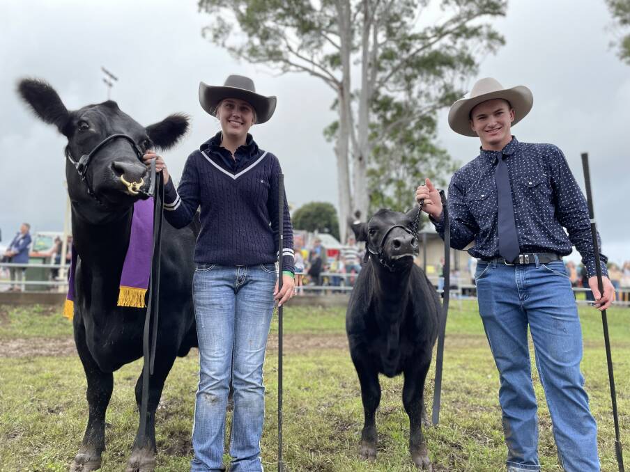 Jazmin Madden from Cedar Creek Angus, Johns River, took out the supreme exhibit at Wauchope Show with her cow and calf. She is pictured with Bailey Whitton. Photos: Samantha Townsend