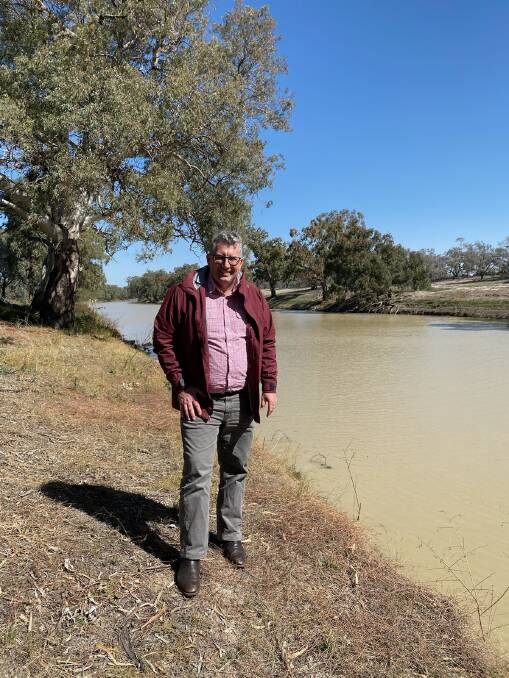 Federal Water Minister Keith Pitt, who is in front of the Darling River, wants to get the money from the emergency water infrastructure rebate scheme into farmer's hands now.
Photo: Supplied