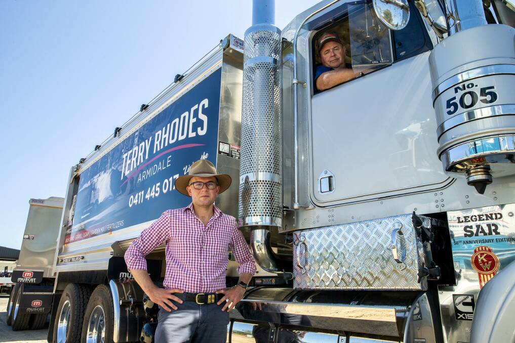 Northern Tablelands MP Adam Marshall, left, with owner of Terry Rhodes Earthmoving in Armidale, Terry Rhodes, supporting the MPs move to abolish payroll tax for regional NSW businesses.