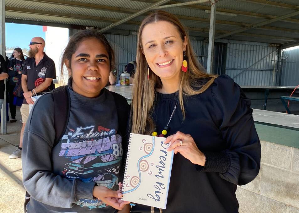 Gamilaroi author author Kylie Captain with a student who attended the Careers on Country expo in Walgett. Picture supplied