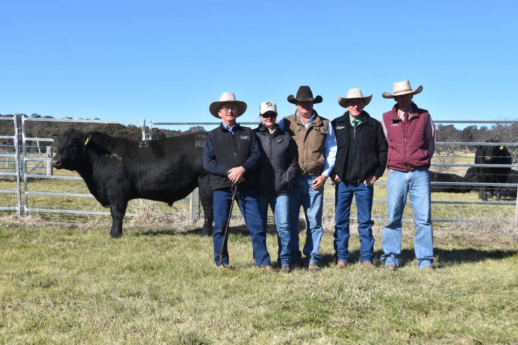 Sara Park stud principal Herb Duddy, Glen Innes, with buyers of one of the two equal top-priced bulls Jane and Cameron Lee, Roma, Qld, Nutiren's Brad Newsome, and auctioneer Robbie Bloch, C.L Squires and Co, Inverell. 
